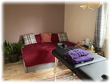 Therapy room with massage table